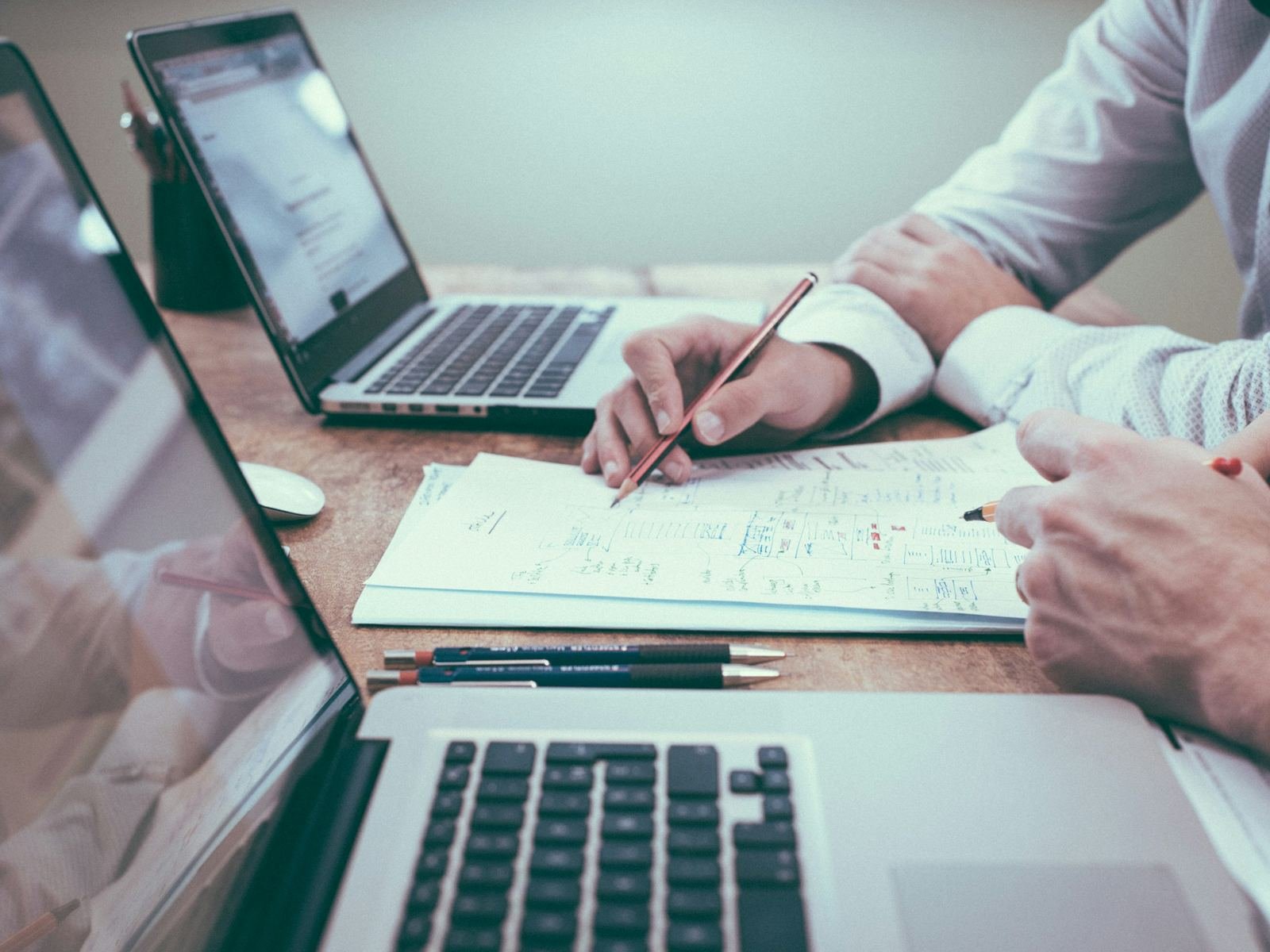 Financial reports and charts on a desk