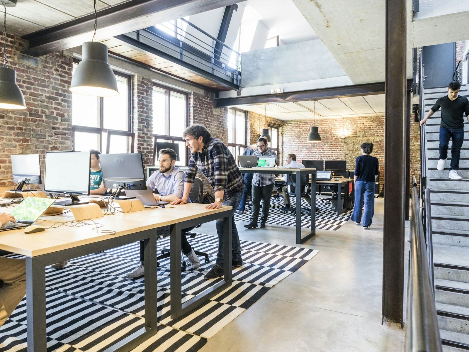 Open-plan office with teams at work